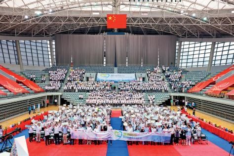 2019 年 7 月 9 日滬港兩地千名中學(xué)生齊聚復(fù)旦大學(xué)禮堂共同慶祝祖國七十華誕